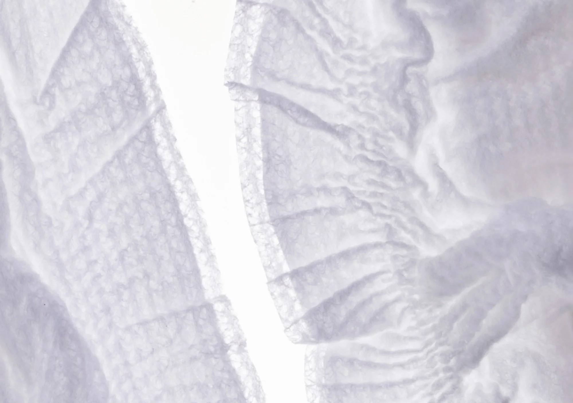 Close-up of the gathered, breathable leg cuffs of a Cushies diaper