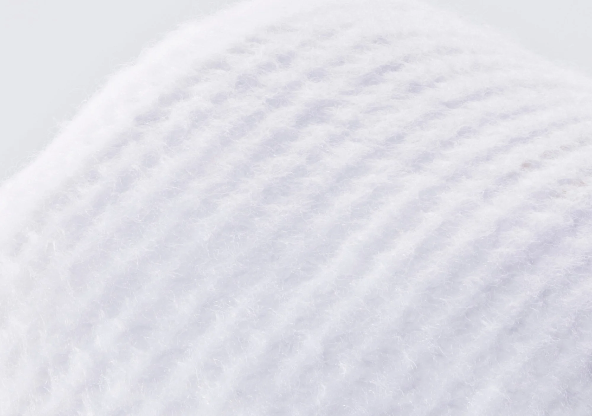 Close-up of the soft, fluffy top sheet of a Cushies baby diaper