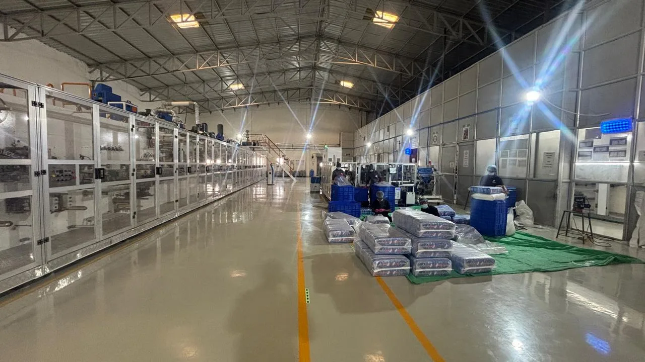 Baby Diaper Distributor: baby diaper production at a Cushies partner facility in India