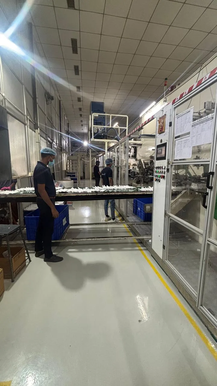Baby diapers being checked on the quality inspection line